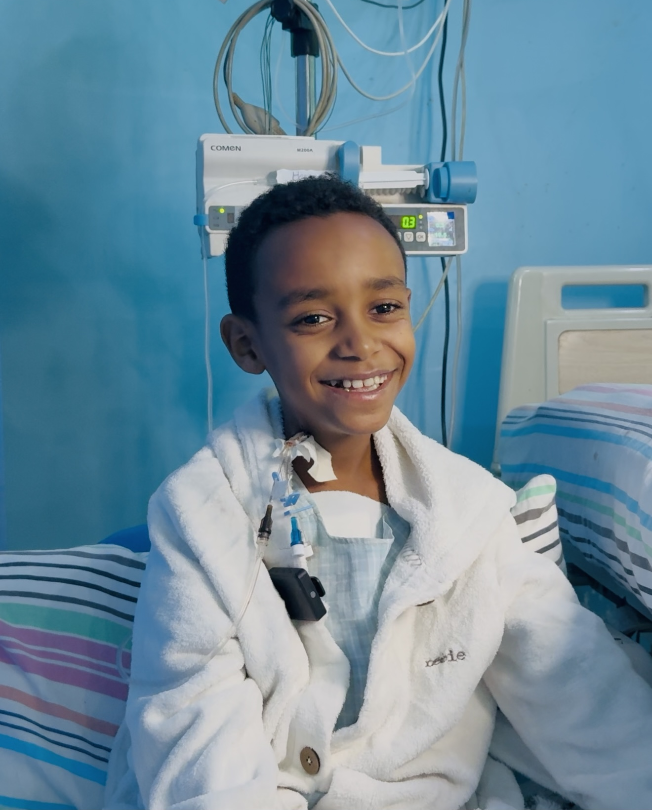 Smiling child who received life-saving cardiac surgery